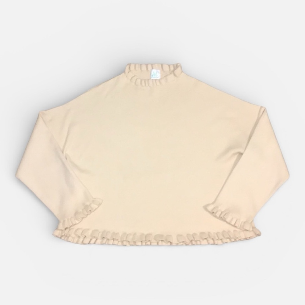 Shop The Mint Ribbed Ruffle Hem Knit Top in Vanilla Size Small